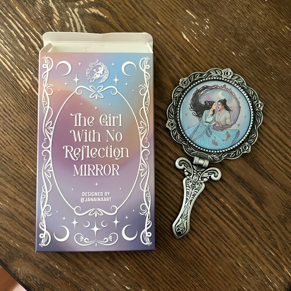 The Girl With No Reflection Hand Mirror
